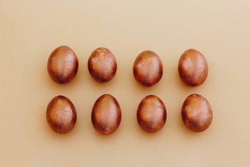 Two rows of golden eggs