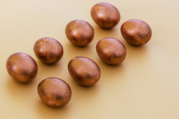 Two rows of golden eggs