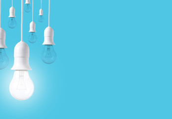 difference light bulb on blue background. concept of new ideas with innovation and creativity.