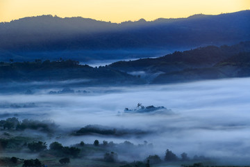 Beautiful Sunrise of travel place with morning mist at Phu Langka National Park in Phayao Province, Thailand
