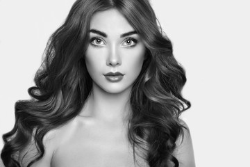 Naklejka premium Portrait of young beautiful girl. Fashion photo. Hairstyle. Make up. Vogue Style. Black and white photo.
