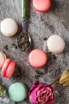 Traditional French sweets. Assorted pink, white macaroon with sp