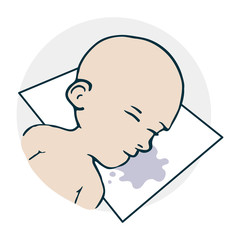 The baby sleeps on a pillow