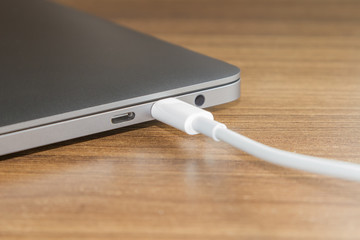 USB type-C port and Cable's White of laptop