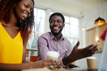 Analysts discussing financial project at meeting