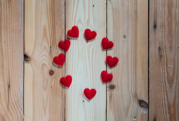 Heart on wooden background,selective focus.