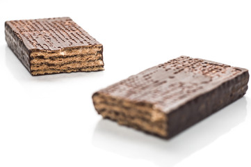 Chocolate wafers isolated on white background, sweet snack in dark cocoa glaze