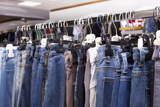 Blue And Purple Jeans In A Shop