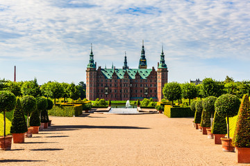 The majestic castle Frederiksborg Castle seen from the beautiful park area,
