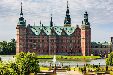 The majestic castle Frederiksborg Castle seen from the beautiful park area,
