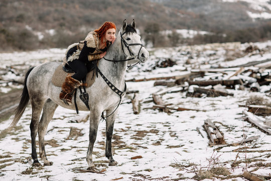Viking girl on horseback