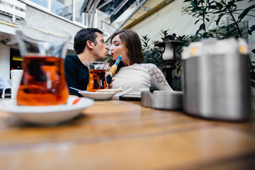 Portrait of stylish couple at outside of cafe
