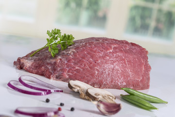 Raw beef meat isolated on white background