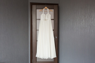 Obraz na płótnie Canvas Bride's wedding dress. Bridal accessories