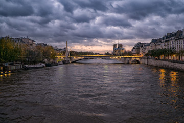 River Seine in Paris, France at dusk, in autumn.