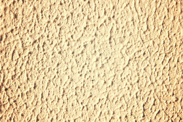 Cracks on surface of painted facade