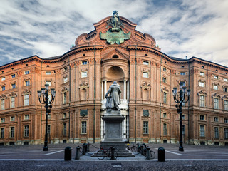 Fototapeta na wymiar Piazza Carignano, one of the main squares of Turin (Italy) with Palazzo Carignano, historic baroque palace and first italian parliament