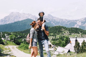 Family spend time on nature in the mountains.