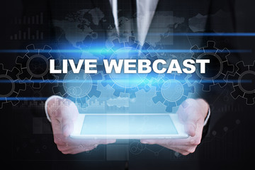 Fototapeta na wymiar Businessman holding tablet PC with live webcast concept.