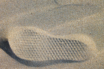Fototapeta na wymiar Footstep in the Sand