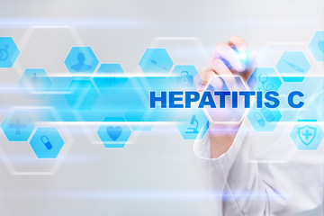 Medical doctor drawing hepatitis c on the virtual screen.
