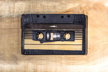 сassette tape recorder on the wooden table