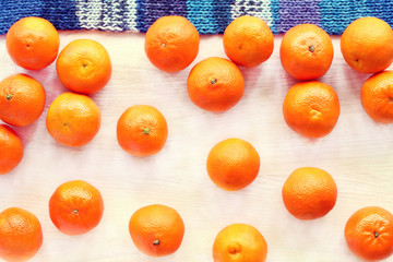 fresh fruit rain/ abstraction of lot of orange tangerine and blue scarf 