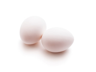 Two Chicken Eggs Isolated on White Background