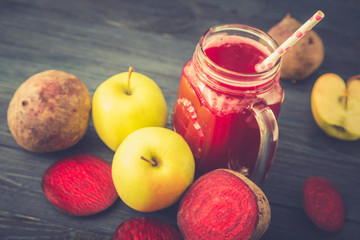 Healthy fresh detox beetroot and apple juice in glass