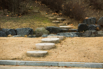 The road of stones in the park. Background.