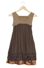 Vintage dress on hanger on a wall