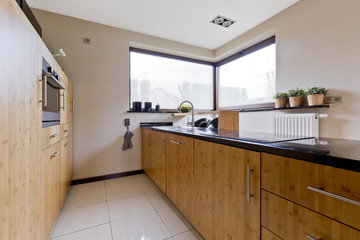 Spacious kitchen with wooden design