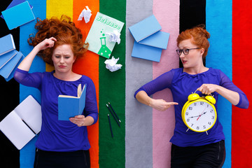 Girls with notes and clock