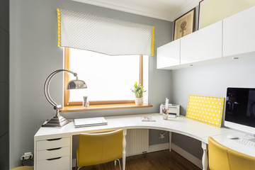 Large, angular desk in an office