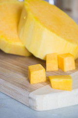 Sliced pumpkin prepared to be cooked on Halloween