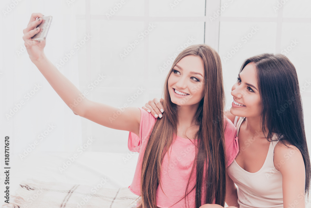 Sticker Happy beautiful best girlfriends making selfie onj smartphone