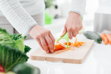 Woman preparing carrots