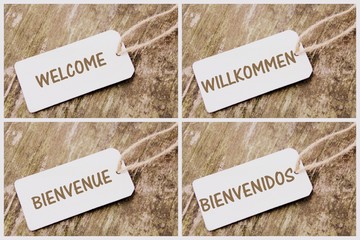 bienvenue,en plusieurs langues sur écriteau,
