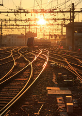Fototapeta na wymiar Sunrise over the railroad tracks at Perrache station in Lyon, France.