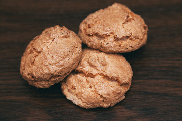 sweet cookies lie on a wooden background