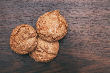 sweet cookies lie on a wooden background