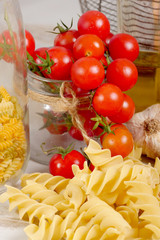 raw pastas with cherry tomatoes