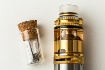 Vaping device, rebuildable atomiser with e-liquid or e-juice of glycerin 