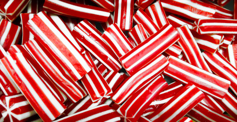 Sweet red and white striped candy, texture, background