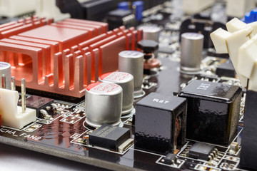 Electronic components installed on the motherboard closeup