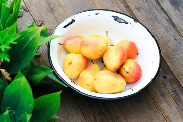 Pears in a plate. Fruit composition.