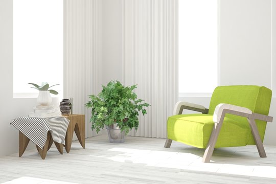 White room with green armchair. Scandinavian interior design