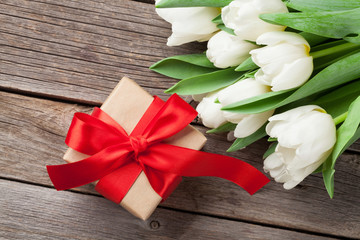 White tulips bouquet and gift box