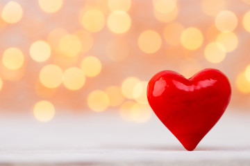 Red hearts the bokeh background. Valentine Day background.