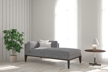 White room with modern sofa. Scandinavian interior design